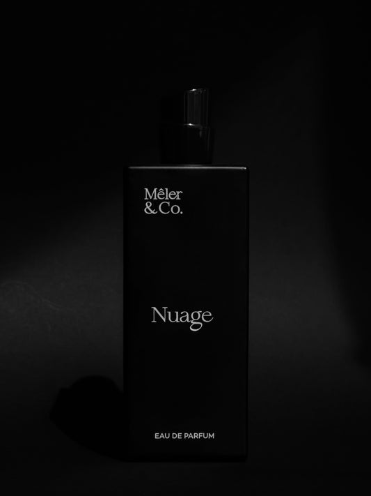 Mêler & Co. Nuage eau de parfum bottle on matte black background